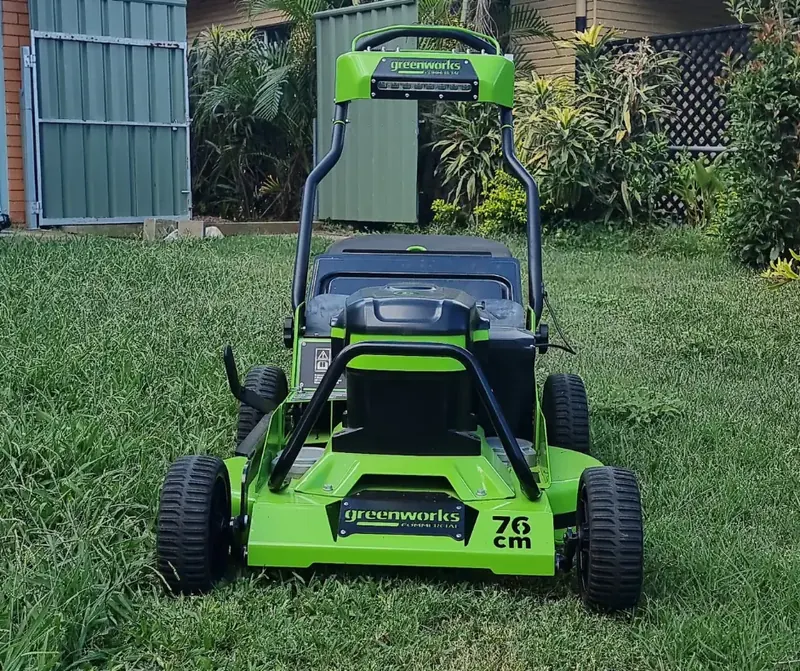 Commercial lawn mower on a freshly cut front lawn in Ipswich